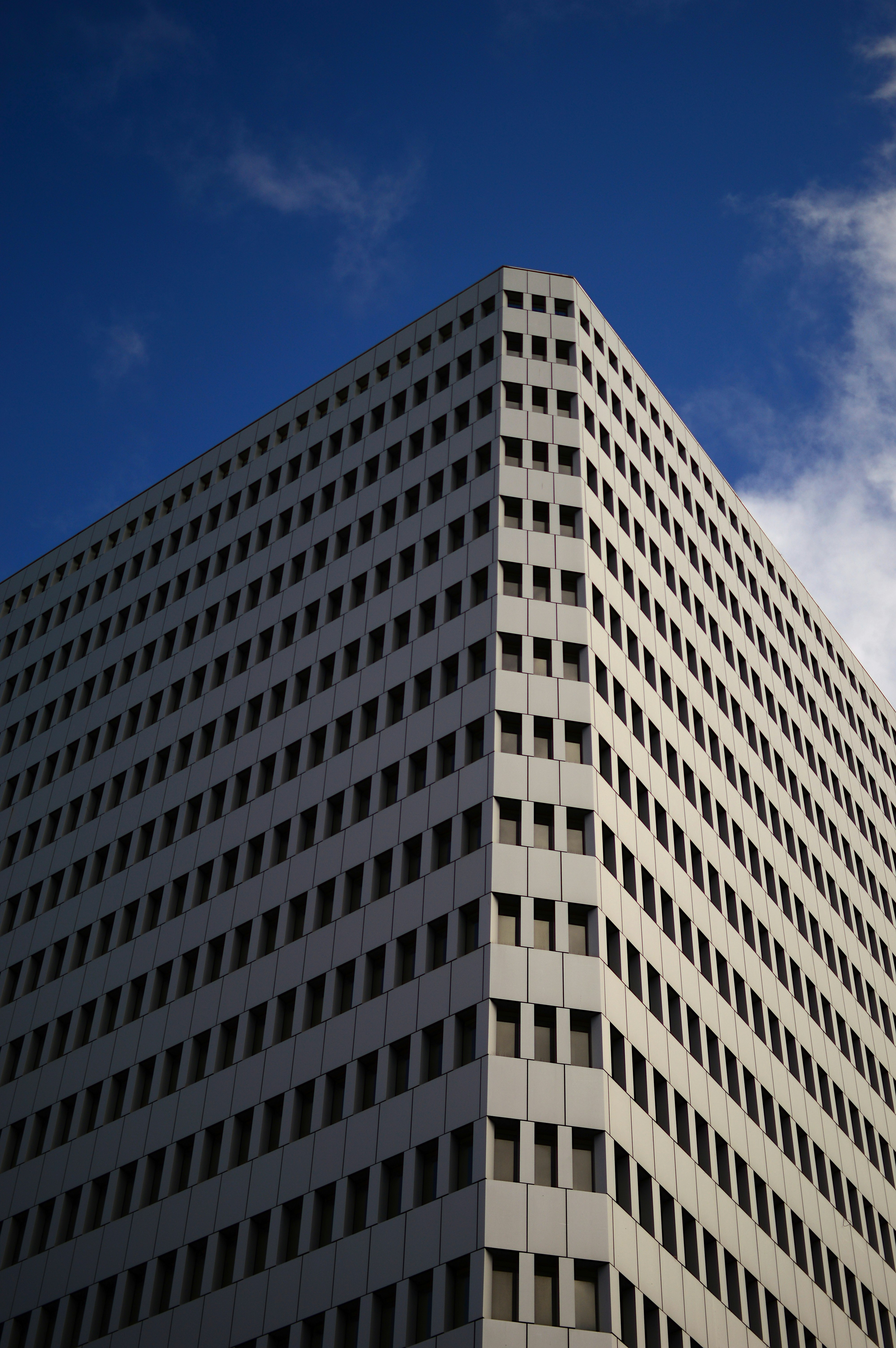 brown concrete building under blue sky during daytime